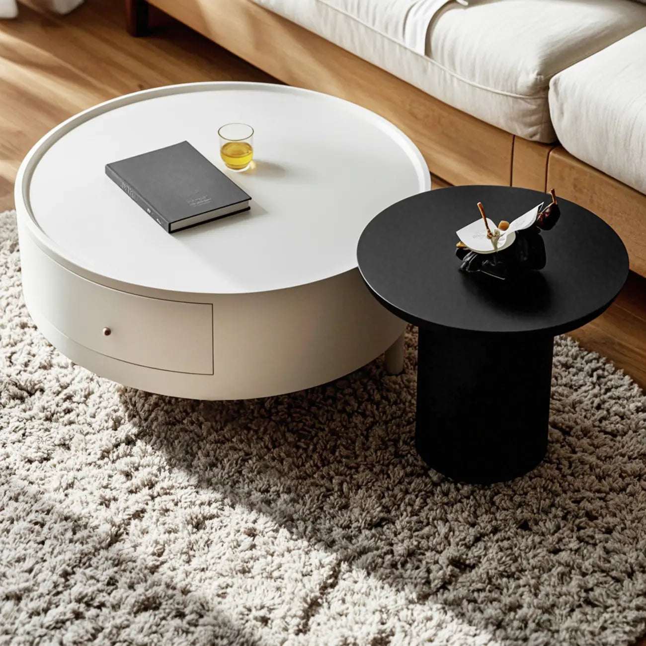 Table basse ronde moderne en bois noir et blanc avec rangement