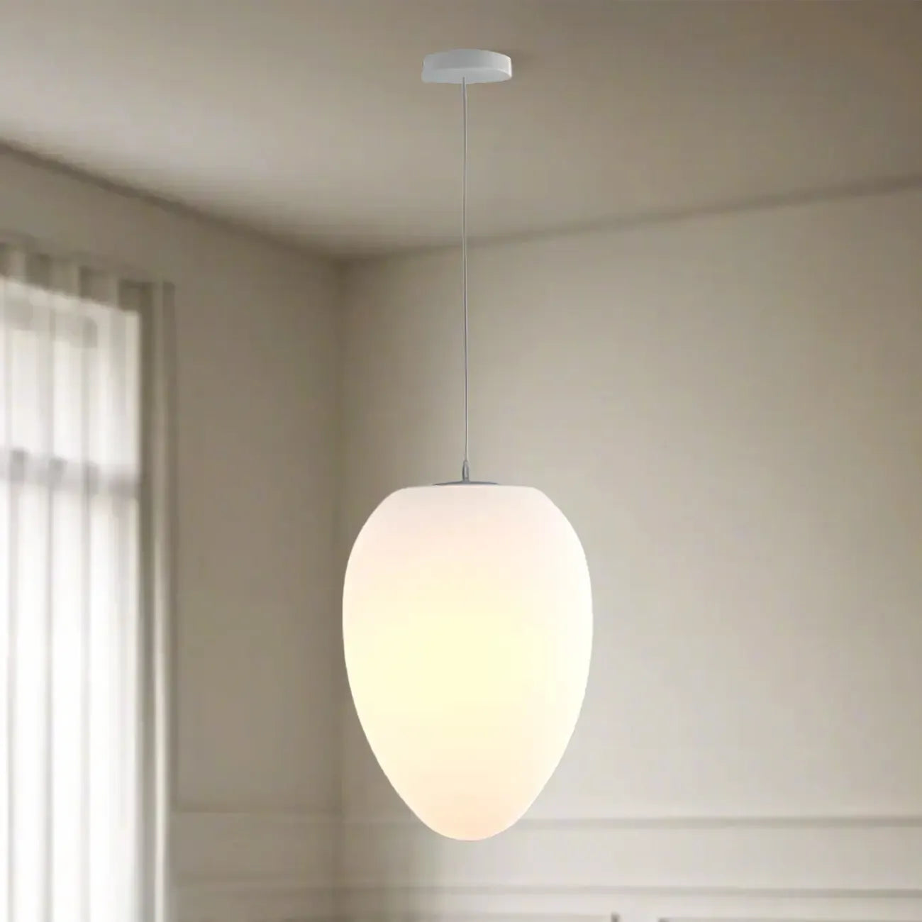 Suspension design en résine crème effet galet pour salle à manger