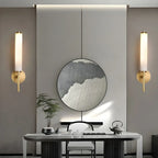 Applique murale moderne cylindrique en pierre dorée avec éclairage LED pour chambre