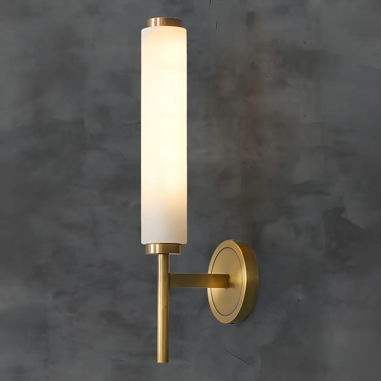 Applique murale moderne cylindrique en pierre dorée avec éclairage LED pour chambre