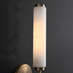 Applique murale moderne cylindrique en pierre dorée avec éclairage LED pour chambre