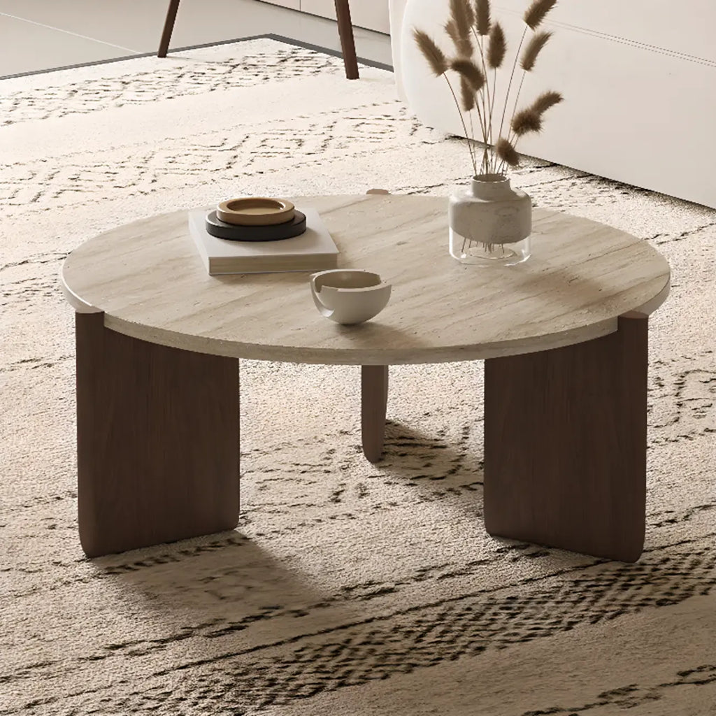 Table basse moderne hexagonale/ronde avec plateau en travertin beige.