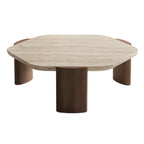 Table basse moderne hexagonale/ronde avec plateau en travertin beige.