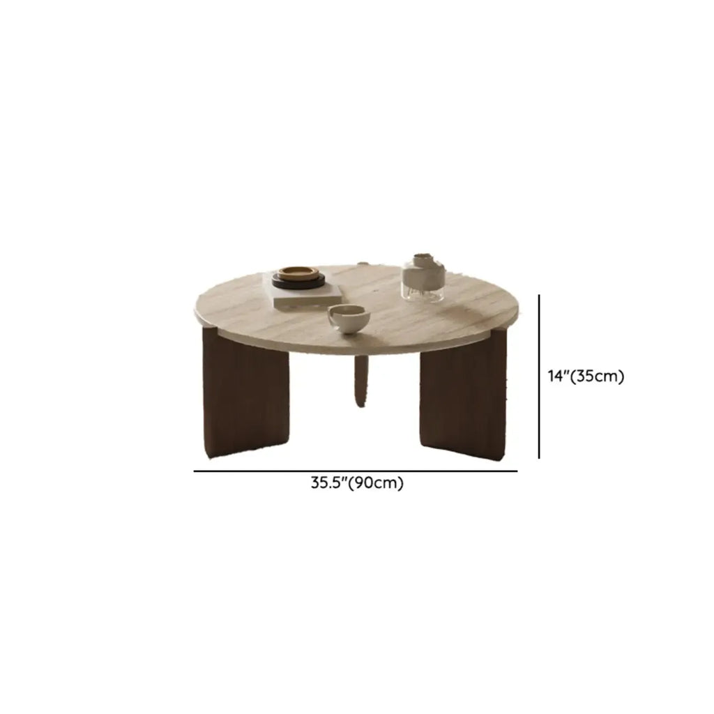 Table basse moderne hexagonale/ronde avec plateau en travertin beige.